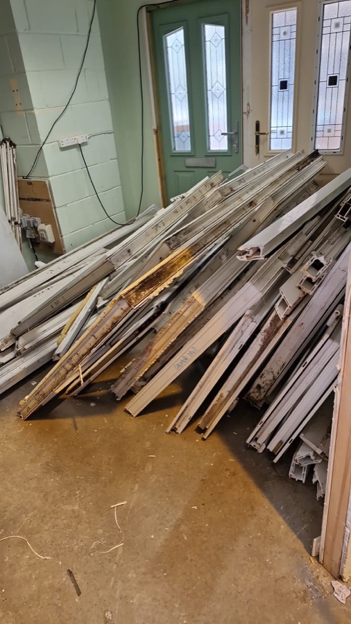 Pile of uPVC profile offcuts and factory scrap